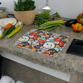 Veelkleurige doedel monster gezichten snijplank