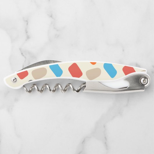 Veelkleurige steentjes op witte achtergrond kurkentrekker (Achterkant)