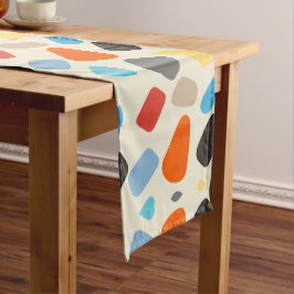 Veelkleurige steentjes op witte achtergrond lange tafelloper