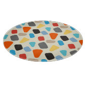 Veelkleurige steentjes op witte achtergrond snijplank (Hoek)