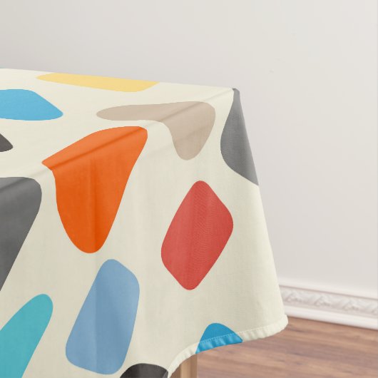 Veelkleurige steentjes op witte achtergrond tafelkleed (Voorbeeld)