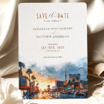 Vegas Golden Twilight Save-the-Date Kaart<br><div class="desc">Verlicht de opwinding van uw aanstaande bruiloft met onze 'Vegas Golden Twilight' Save-the-Date uitnodiging. Deze uitnodiging verblindt met een levendige waterverf van de Las Vegas Strip, vastgelegd op het magische moment wanneer de neonlichten beginnen te schitteren tegen de ondergaande zon. De hemel is een doek van gouden geel en diepe...</div>