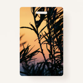 Vegetatie bij zonsondergang badge