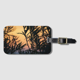 Vegetatie bij zonsondergang bagagelabel