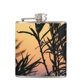 Vegetatie bij zonsondergang heupfles