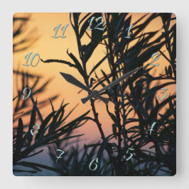 Vegetatie bij zonsondergang vierkante klok