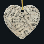 vel muziekpapier Collage Keramisch Ornament<br><div class="desc">Een papiercollage van muziek uit vel van ongeveer 100 jaar oud. Ik heb de randen van veel stukken gekanteld om er een definitie van te geven. Fotografie en papieren collage kunst van Sandra Foster © Sandra Foster Design - Zazzle.</div>