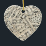 vel muziekpapier Collage Keramisch Ornament<br><div class="desc">Een papiercollage van muziek uit  vel van ongeveer 100 jaar oud. Ik heb de randen van veel stukken gekanteld om er een definitie van te geven. Fotografie en papieren collage kunst van Sandra Foster © Sandra Foster Design - Zazzle.</div>