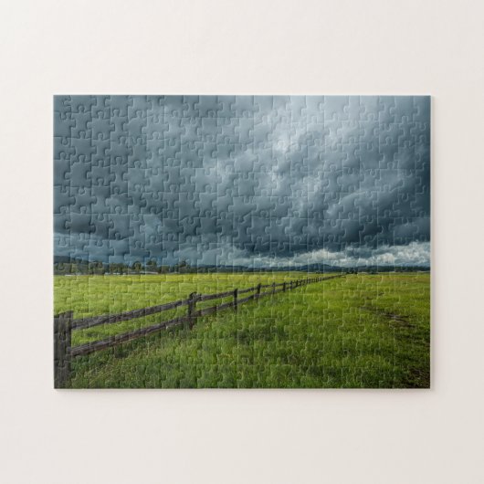 Veld met een houten hek legpuzzel (Horizontaal)