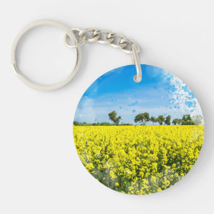 Veld met gele bloemen en blauwe hemel sleutelhanger