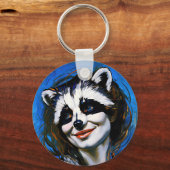 "Velka Teyani" fluisterende wasbeer Trickster Sleutelhanger (Voorkant)