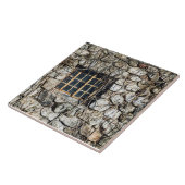 Venster in een muur van steen tegeltje (Zijkant)