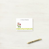 Ventilatoren van roze en roze tulpen post-it® notes (Op bureau)