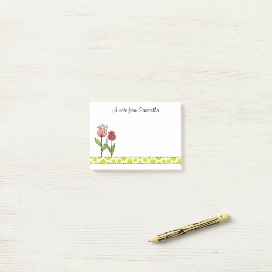 Ventilatoren van roze en roze tulpen post-it® notes (Op bureau)