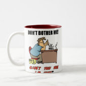 Verander me niet dat ik bezig ben tweekleurige koffiemok (Links)