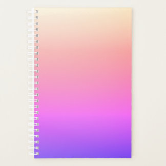 Verblekende perzik roze en paarse kleurrijke ombre planner
