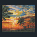 Verbluffend tropisch zonsonderstel puzzel<br><div class="desc">"Stunning Tropical Sunset II" door Carolee Vitaletti. Met een zonsondergang tegen bomen en water op het strand.</div>