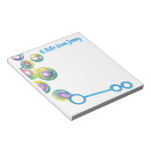 Verbluffende regenboogzeepbellen op maat notitieblok (Schuin)