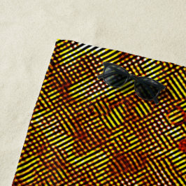 Verbrandingsresten en gekleurde schaken strandlaken