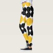 Verduisterende cirkels, geel en zwart patroon ontw leggings (Links)