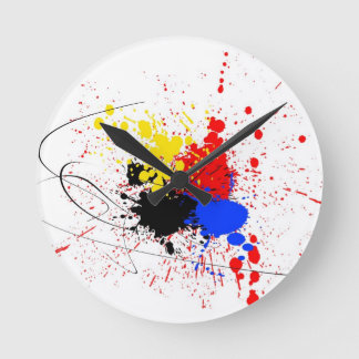 Verf Splatter Kunstzwart Blauw Rood Geel Ronde Klok