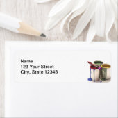 Verfblikken in rood-groen geel etiket (Insitu)