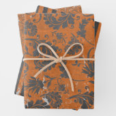 Verhard verbrand sinaasappel en grijs gepatterd inpakpapier vel (In situ)