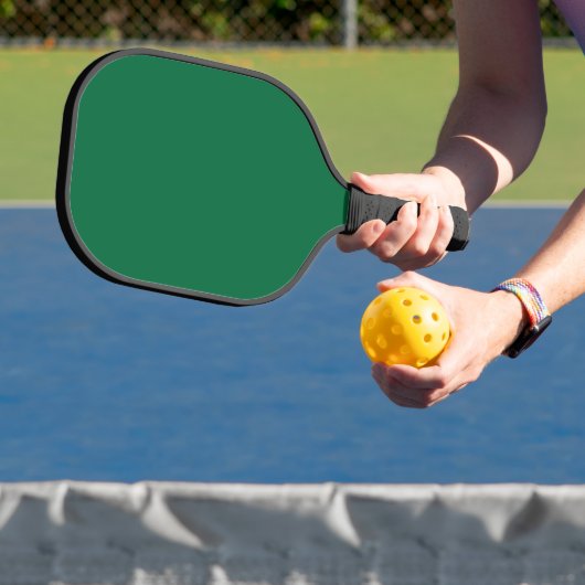 Verhoog uw webdesign met een groene achtergrond pickleball paddle (Insitu)