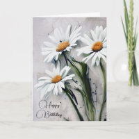 Verjaardagsmadeliefjes op grijze textuur