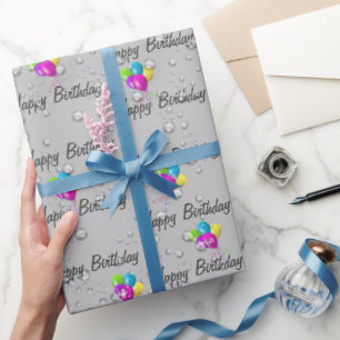 Verjaardagsregendruppels en ballonnen op grijs cadeaupapier
