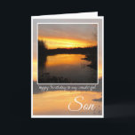 Verjaardagszoon, Dark Oranje Sunrise Reflection. Kaart<br><div class="desc">Happy Birthday Son, prachtige felle oranje zonsopgang achter gestreepte wolken en duistere bomen, met oranje en paarse rivierreflectie. Tekst: Gelukkige Verjaardag aan mijn prachtige Zoon. De binnenste kaart is leeg.</div>