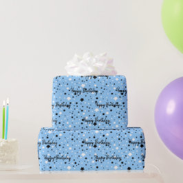 Verjaarsterren op blauw cadeaupapier