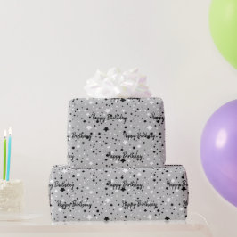 Verjaarsterren op grijs omslagpapier cadeaupapier