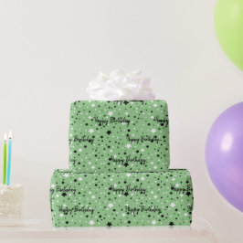Verjaarsterren op groen cadeaupapier