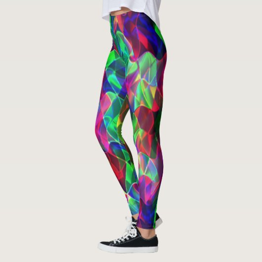 Verkleurde gebogen driehoeken of rimpels, donkerst leggings (Links)