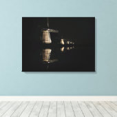Verlichte windmolens bij nacht canvas print (Insitu (Houten vloer))
