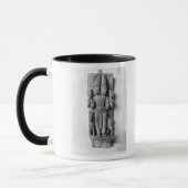 Verlichting met een dubbelzijdig afbeelding van Ag Mok (Links)