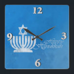 Verlichting van de Menorah Vierkante Klok<br><div class="desc">10.75 x 10.75" acrylic clock with an image of a pale blue and white menorah topped with a Star of David on grungy blue. See the entire Hanukkah Clock collection under the HOME category in the HOLIDAYS section.</div>