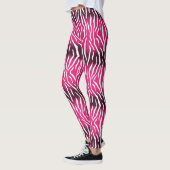 Verlooproze en witte tijgerafdrukken leggings (Links)