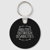 Vermogen weegt zwaarder dan handicaps 0 handicaps sleutelhanger (Achterkant)