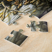 Verpakking van wolven die over een logboek springe legpuzzel (Zijkant)