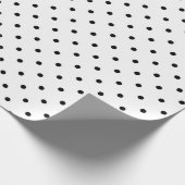 Verpakkingspapier met zwarte stippen op witte acht cadeaupapier (Hoek)