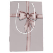 Verpakt in een roze strik medium cadeauzakje (Voorkant)