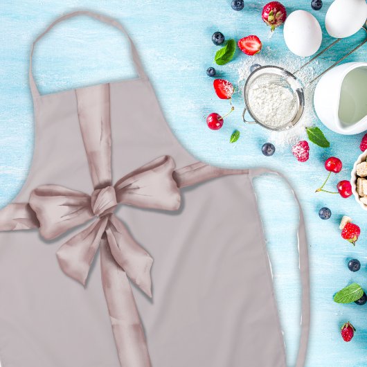 Verpakt in een roze strik schort