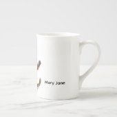 Verpleegster die een kopje koffie drinkt porselein kop (Rechts)