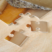 Verschillende kazen op het kookbord legpuzzel (Zijkant)