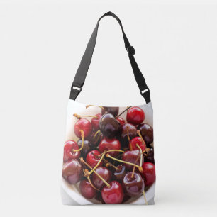 Verse rode kersen in een kom foto crossbody tas