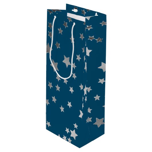 Verspreid sterrenpatroon op blauw wijn cadeautas (Voorkant Gekanteld)