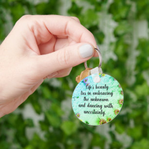  Verspreide Bloemen Inspirerend Quote Sleutelhanger