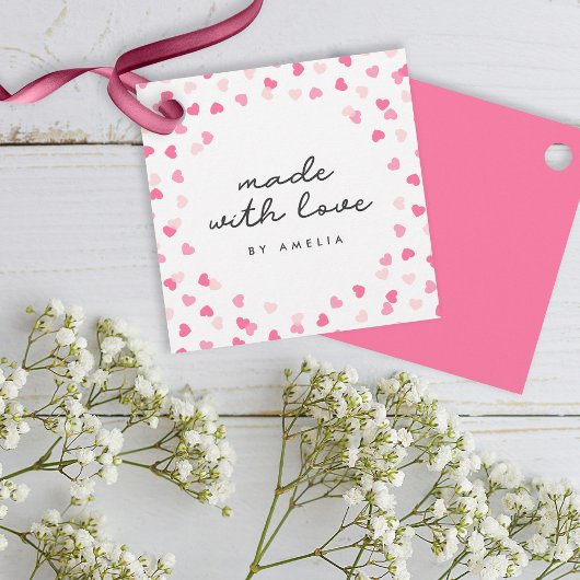 Verspreide roze harten gemaakt van Confetti met li Bedankjes Labels